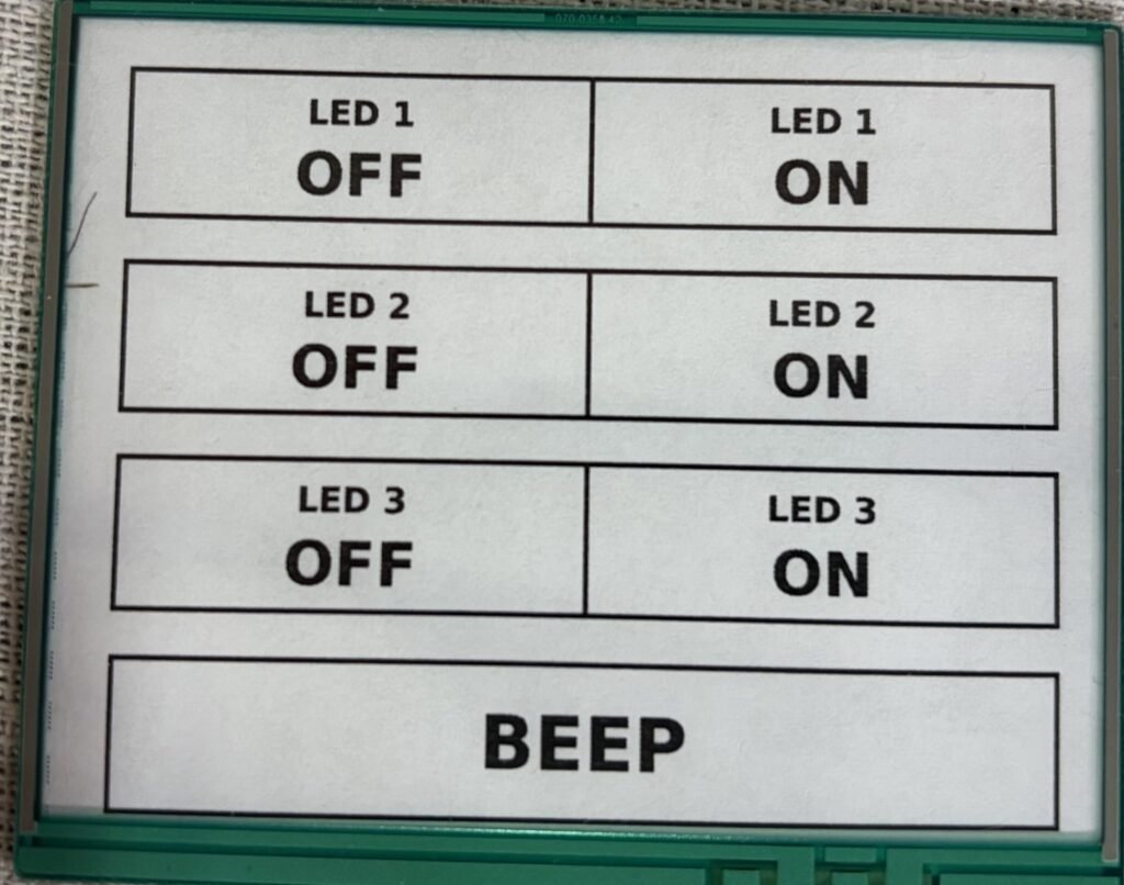 STM32 resistive touch screen with the printed layout sheet attached to the back
